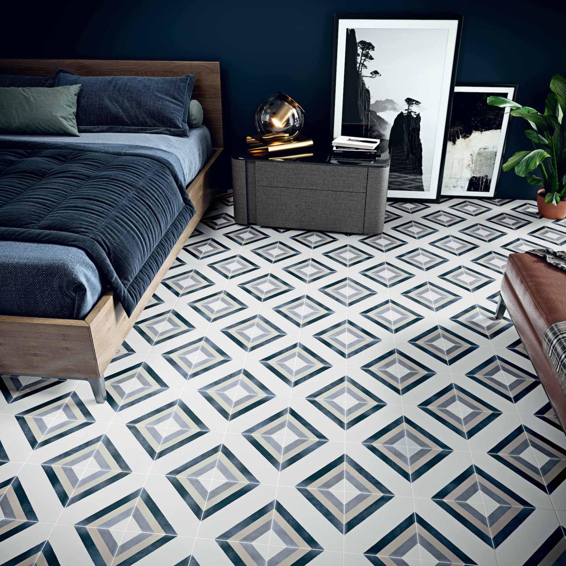 Stylish bedroom featuring patterned ceramic tiles from Spain, showcasing contemporary design and elegant home decor trends.