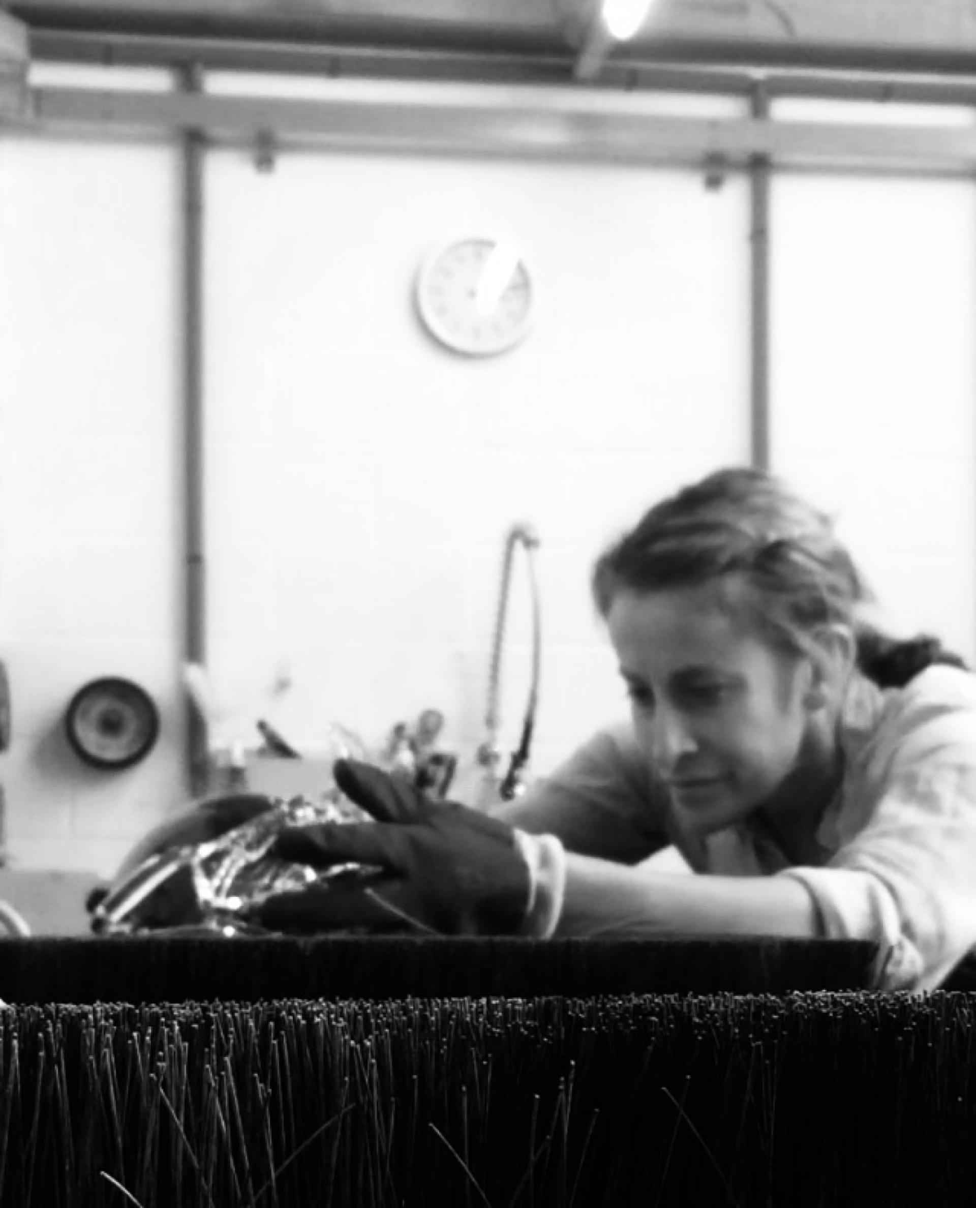 Nicola Schellander meticulously crafts British crystal in her studio, showcasing her innovative design techniques and dedication to the craft.