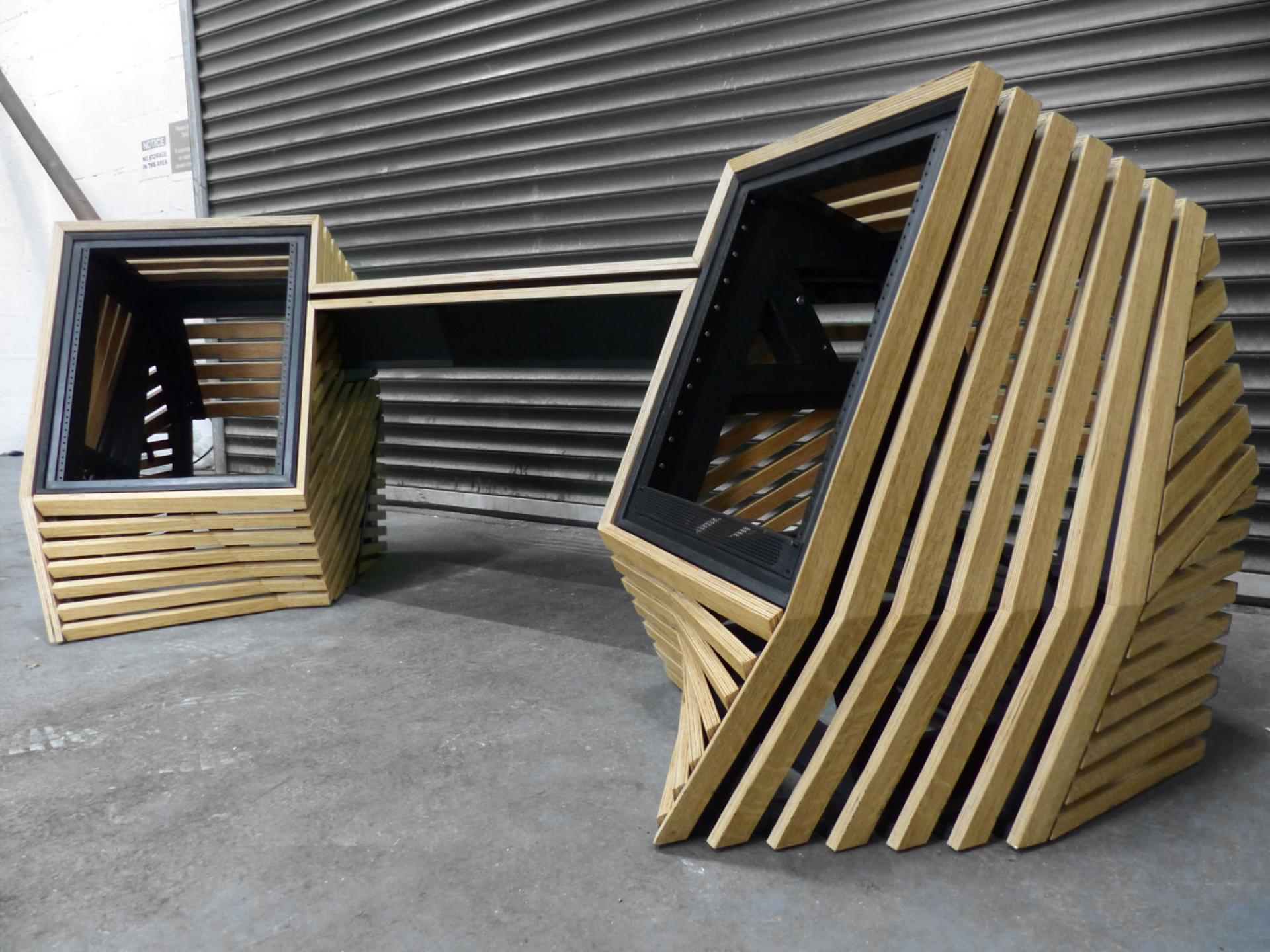 Contemporary wooden desk featuring geometric design elements, showcasing Bristol's vibrant creative craft scene.