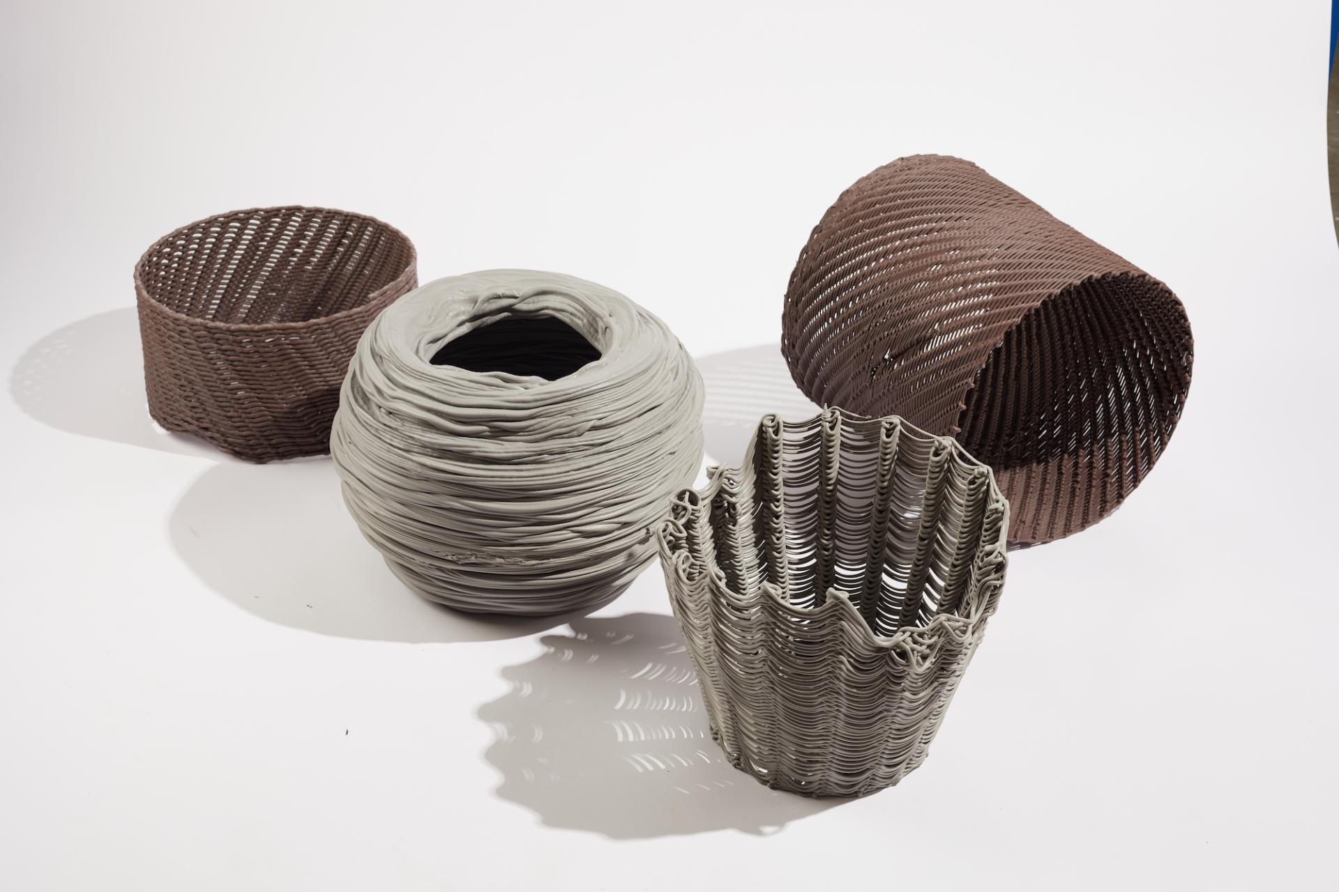 Artistic showcase of unique, textured baskets in various colors at Material Matters, London Design Festival 2023.