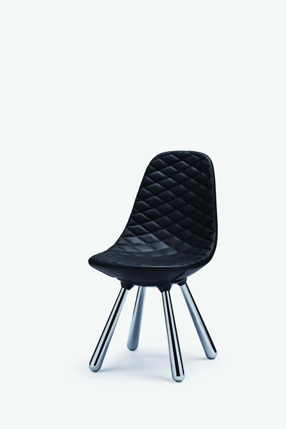 Contemporary black quilted chair with chrome legs, part of Established & Sons' new seating collection.