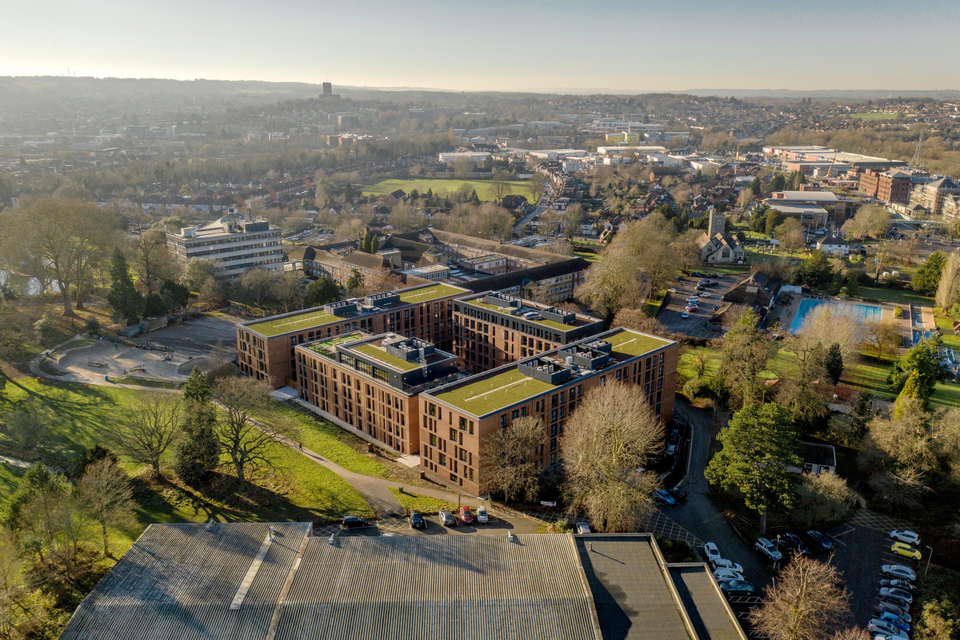 Aerial view of the Marion Room designed by DMWR Architects, showcasing innovative architecture amidst a vibrant urban landscape.