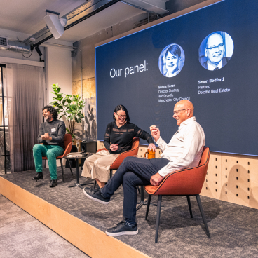 Panel discussion featuring Becca Heron and Simon Bedford, exploring Manchester's property growth trends and strategies.