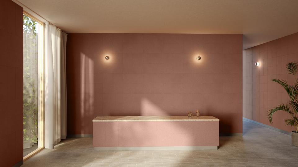 Elegant interior showcasing CornWall® material, featuring a soft pink wall and a stylish countertop.