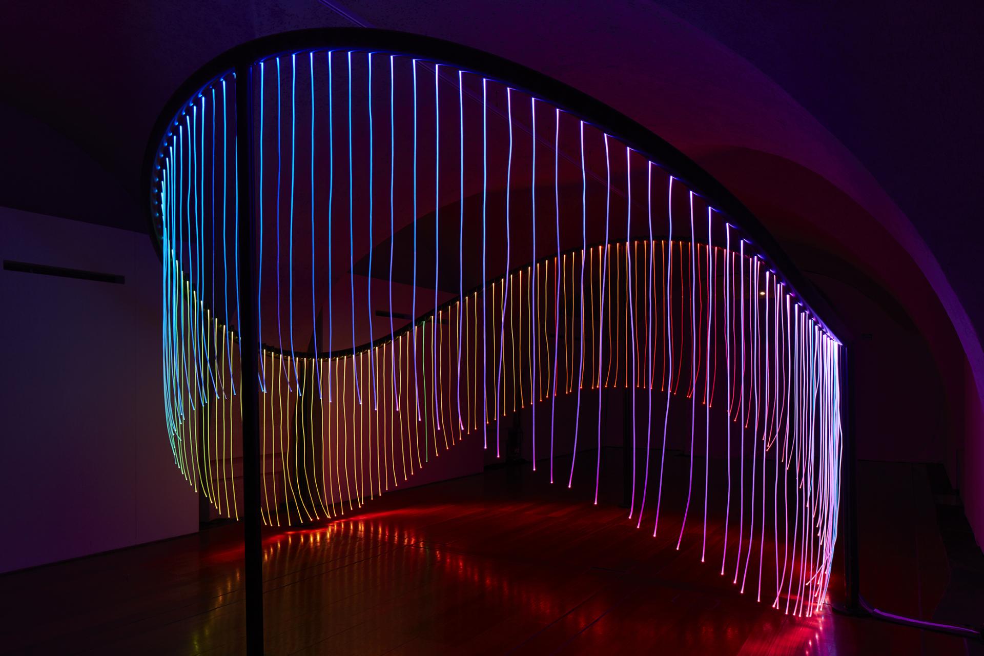 Colorful LED light installation creates a stunning visual wave effect at the London Design Biennale, Somerset House.