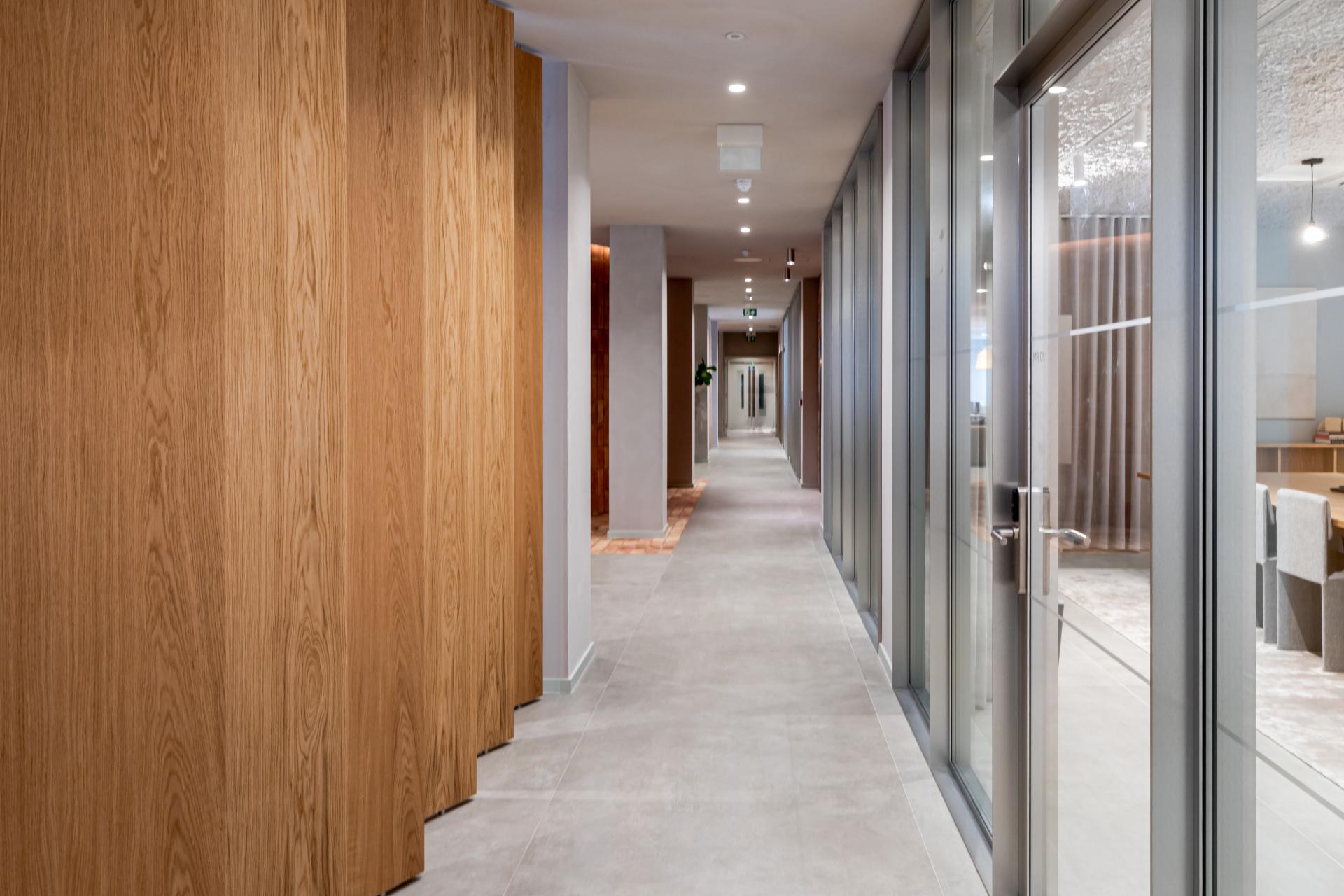 Modern corridor showcasing a sleek, flexible workspace design at The Office Group's Fora in Chancery House, Holborn.