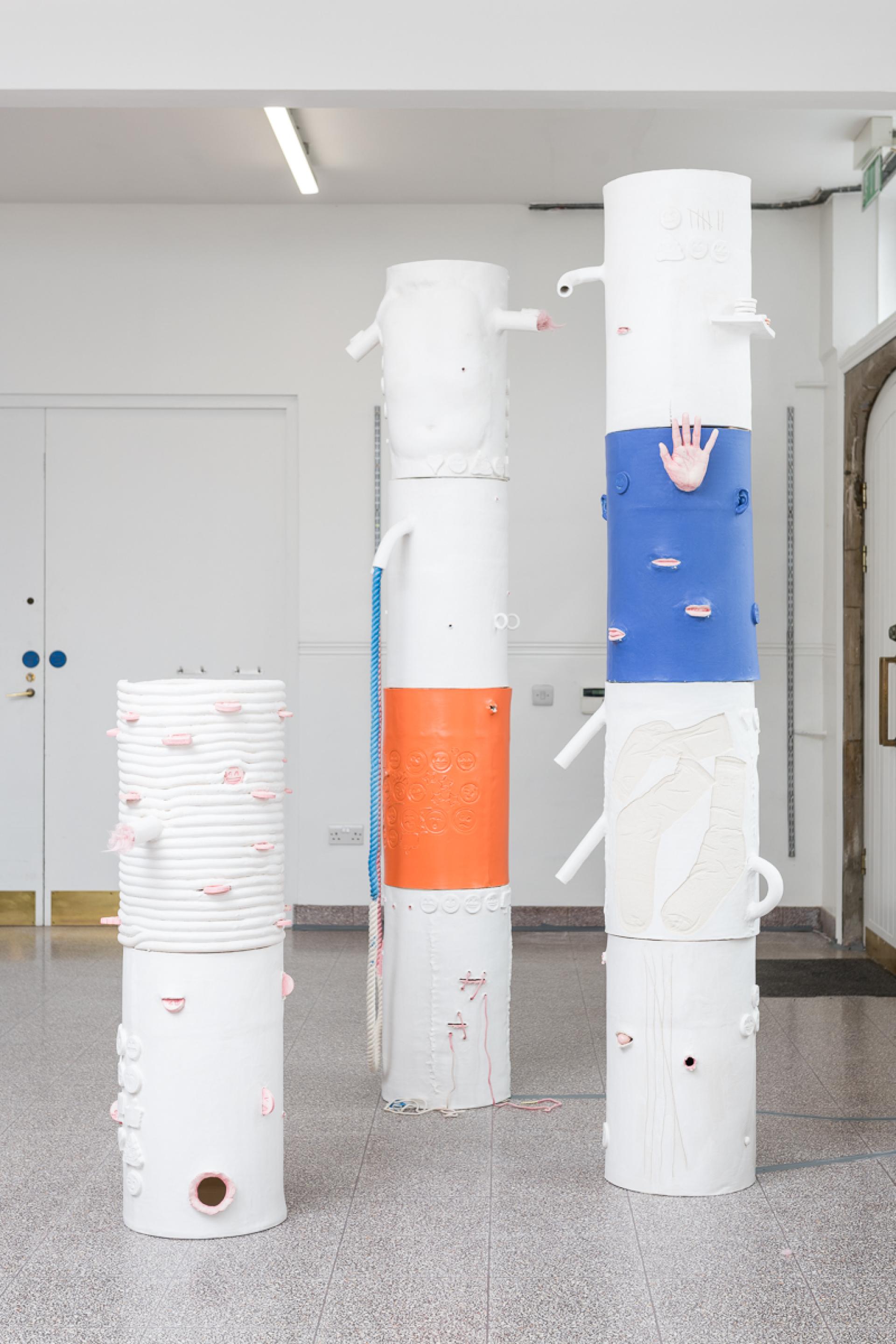 Three abstract sculptures, featuring vivid colors and textured forms, displayed at London Craft Week 2019.