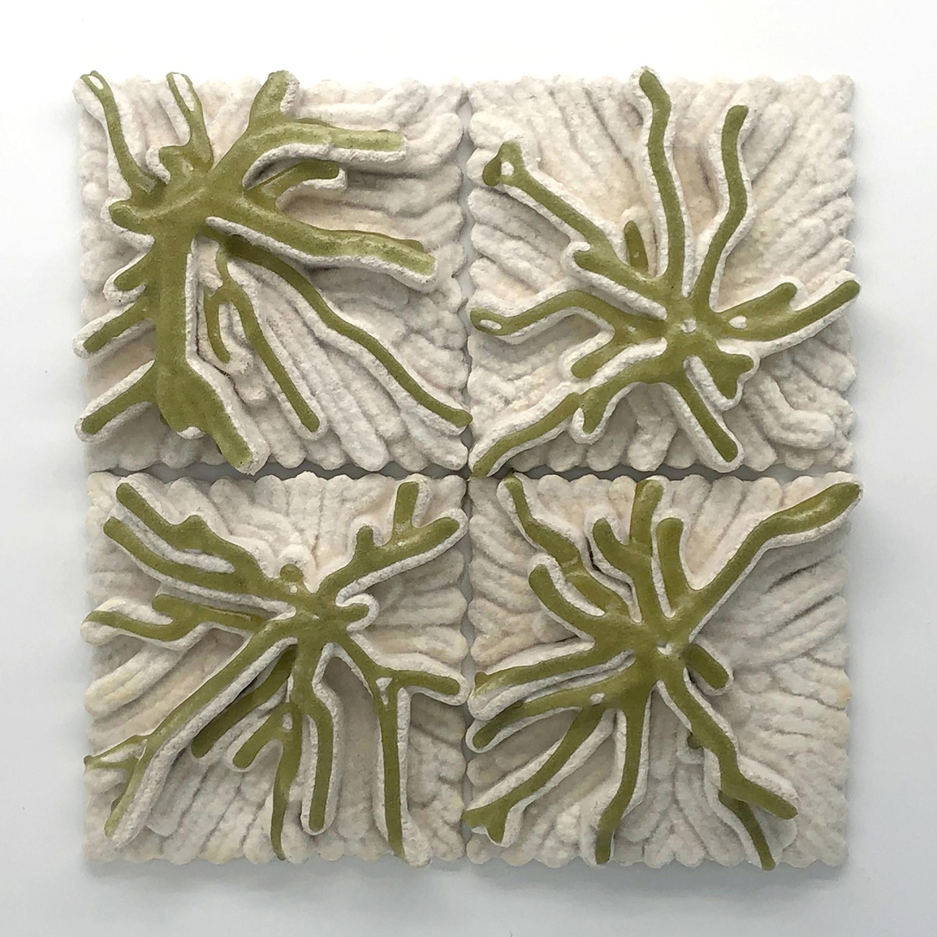 Decorative 3D-printed tiles featuring organic patterns, showcasing innovative designs in sustainable architecture and construction.