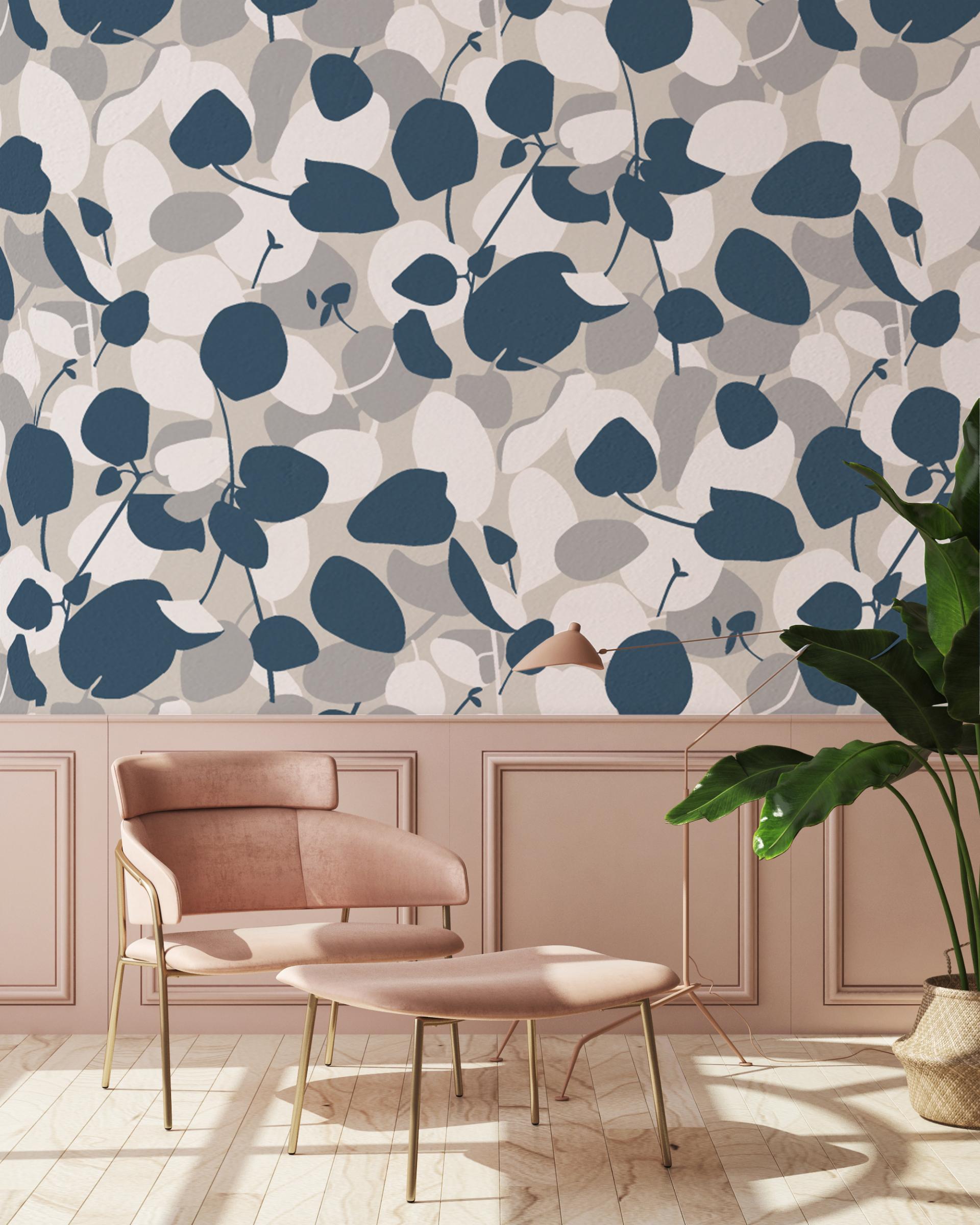 Customizable wallpaper featuring abstract leaf patterns in blue, white, and gray, enhancing a contemporary interior space.