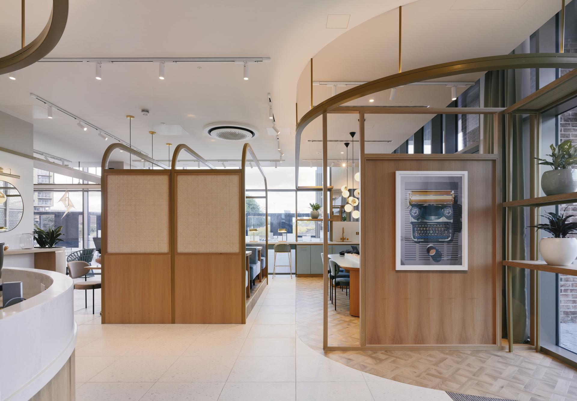 Modern residential amenity space featuring stylish design elements, cozy seating, and natural lighting at The Headline, Leeds.