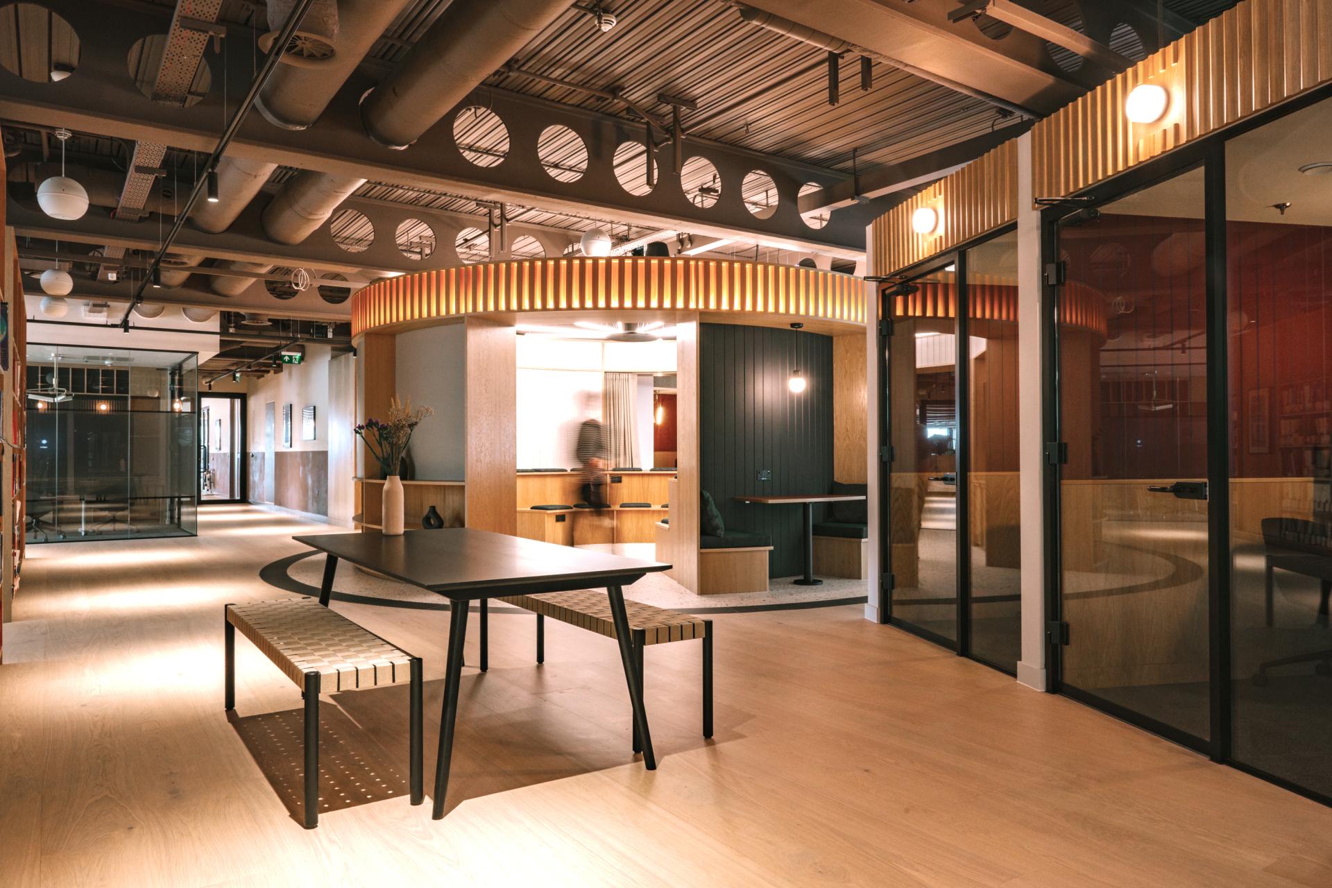 Modern workspace design in Edinburgh showcasing natural materials and collaborative areas inspired by Scotland's makers heritage.