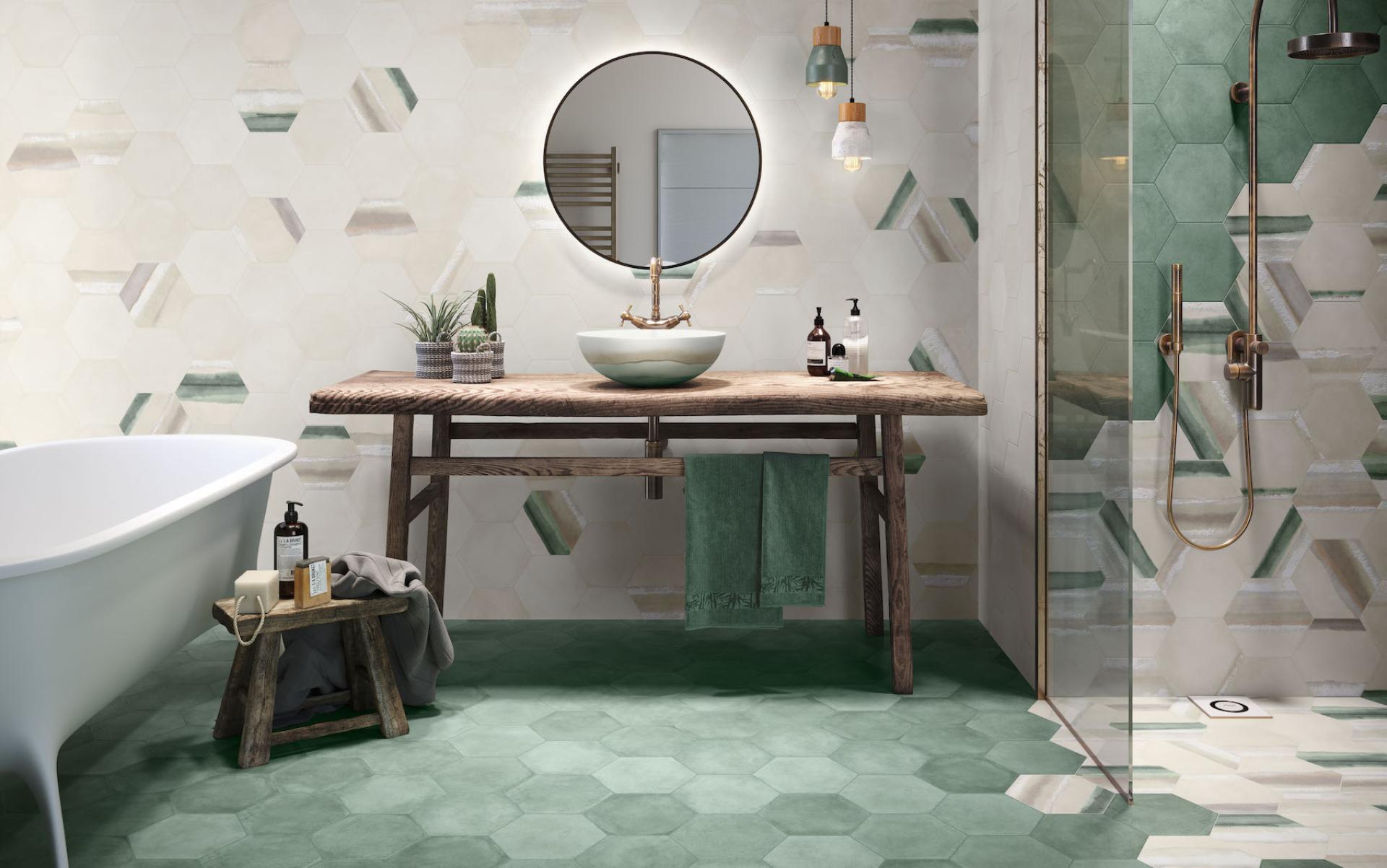 Elegant bathroom featuring hexagonal tiles, wooden vanity, and a serene green color palette, highlighting Spanish tile design trends.