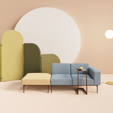 Stylish Otto seating from sixteen3 with vibrant cushions, complemented by decorative partitions and a modern floor lamp.