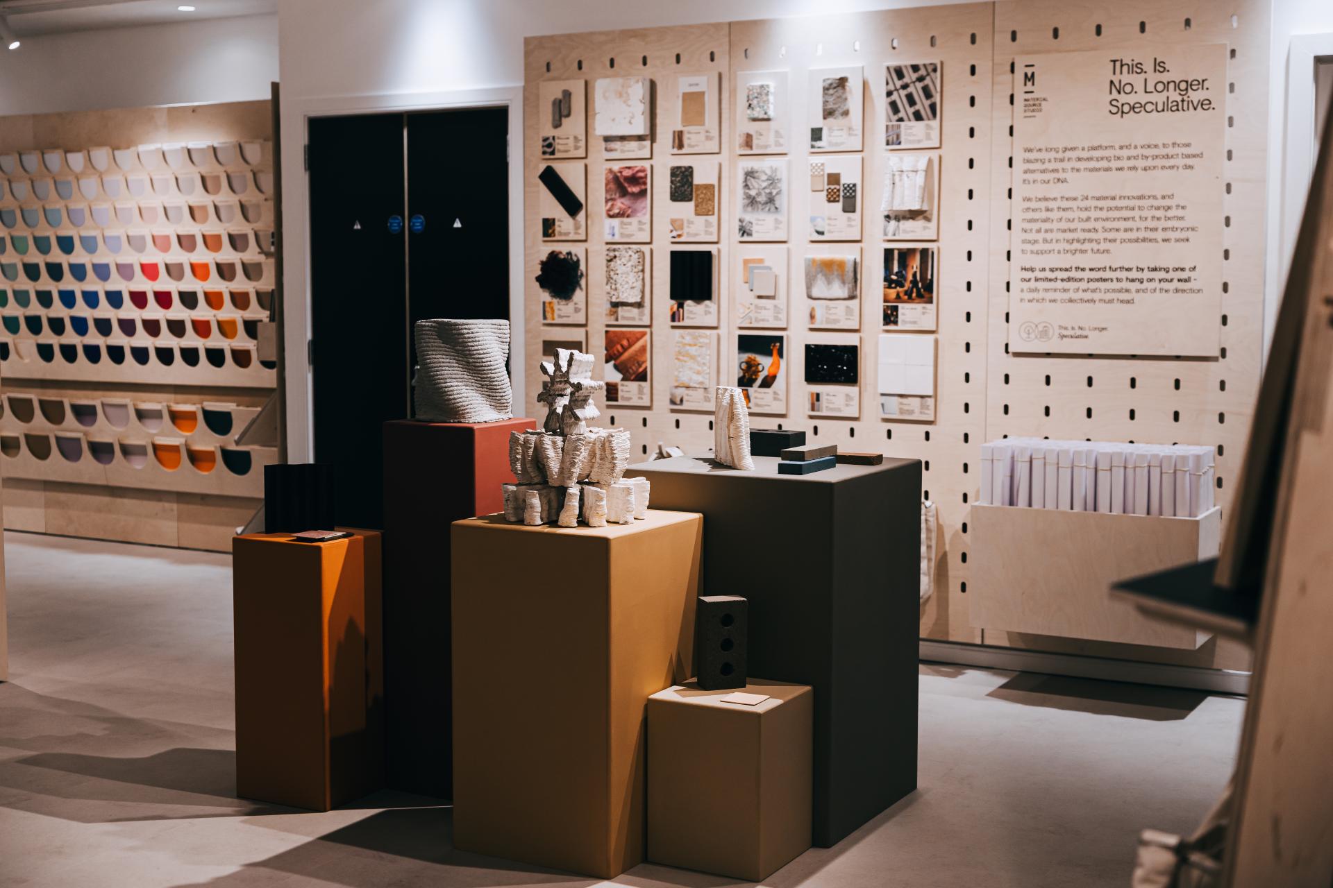 Exhibition space showcasing innovative bio-based materials and products at Material Source Studios, highlighting sustainability and design.