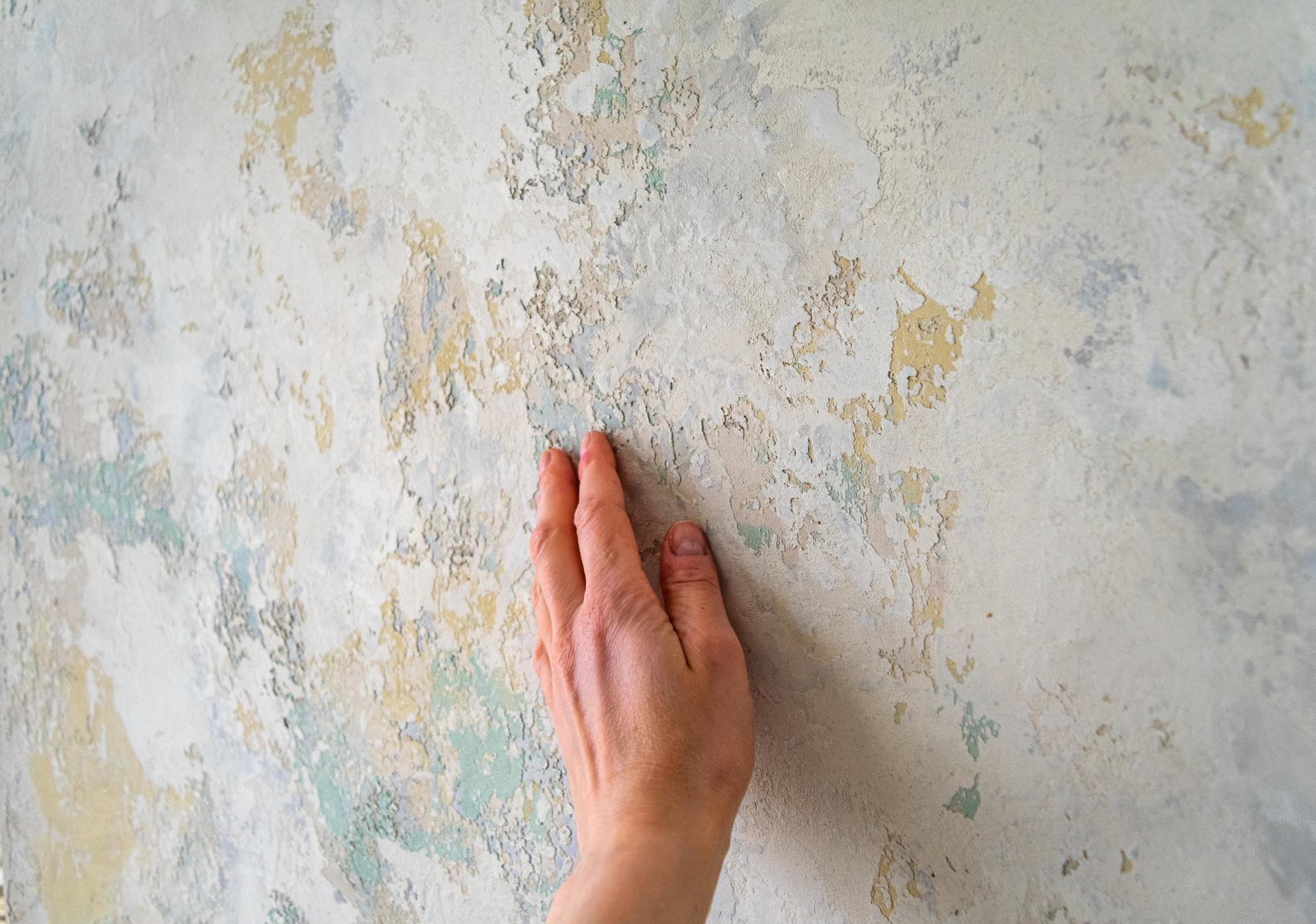 Artisan wall finish showcasing textured layers and subtle colors, reflecting Vacarda Design's craftsmanship at Decorex International 2019.