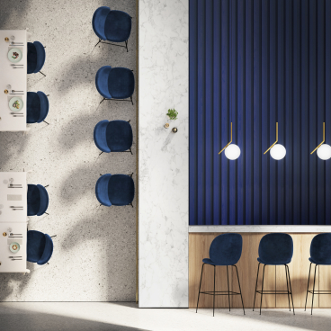 Stylish interior of a modern dining space with navy chairs and a sleek countertop, showcasing contemporary design elements.