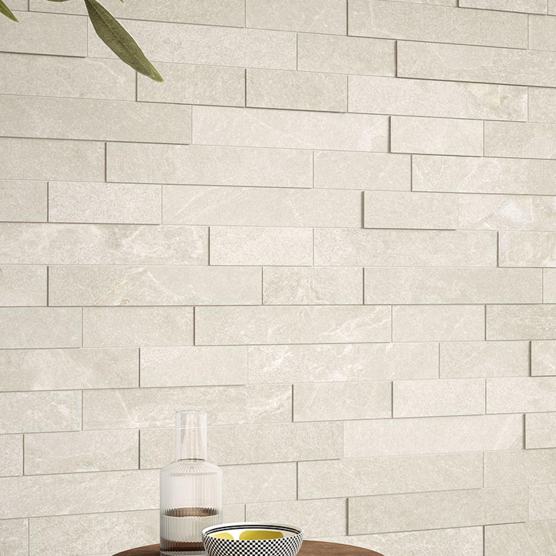 Modern interior featuring Grestec's Cellan collection of textured slate-inspired wall tiles with stylish decor elements.