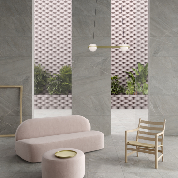Stylish interior showcasing VitrA's textured tiles, modern furniture, and a unique color palette at Cersaie 2018.
