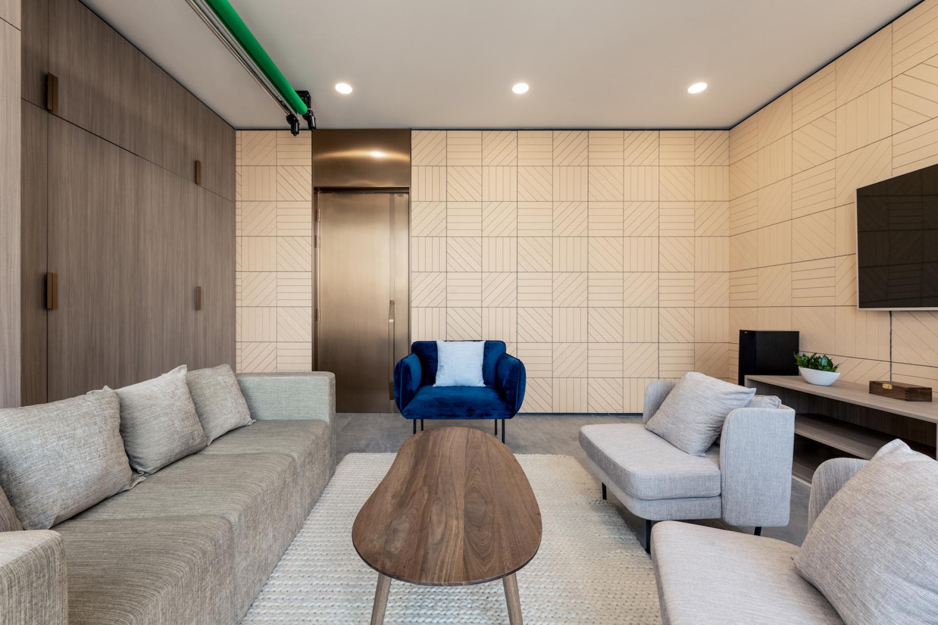 Modern office lounge designed by Bean Buro for Warner Music, featuring stylish seating and contemporary decor in Beijing.