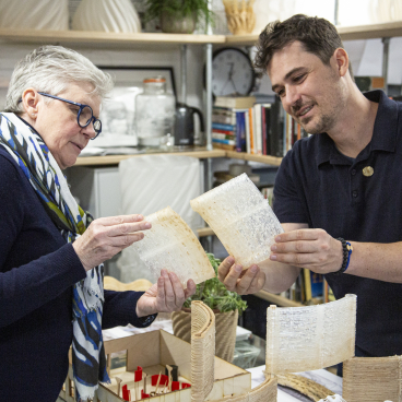 Anne Asensio and Arthur Mamou-Mani examine innovative design materials at the Design Museum during COP26 discussions.