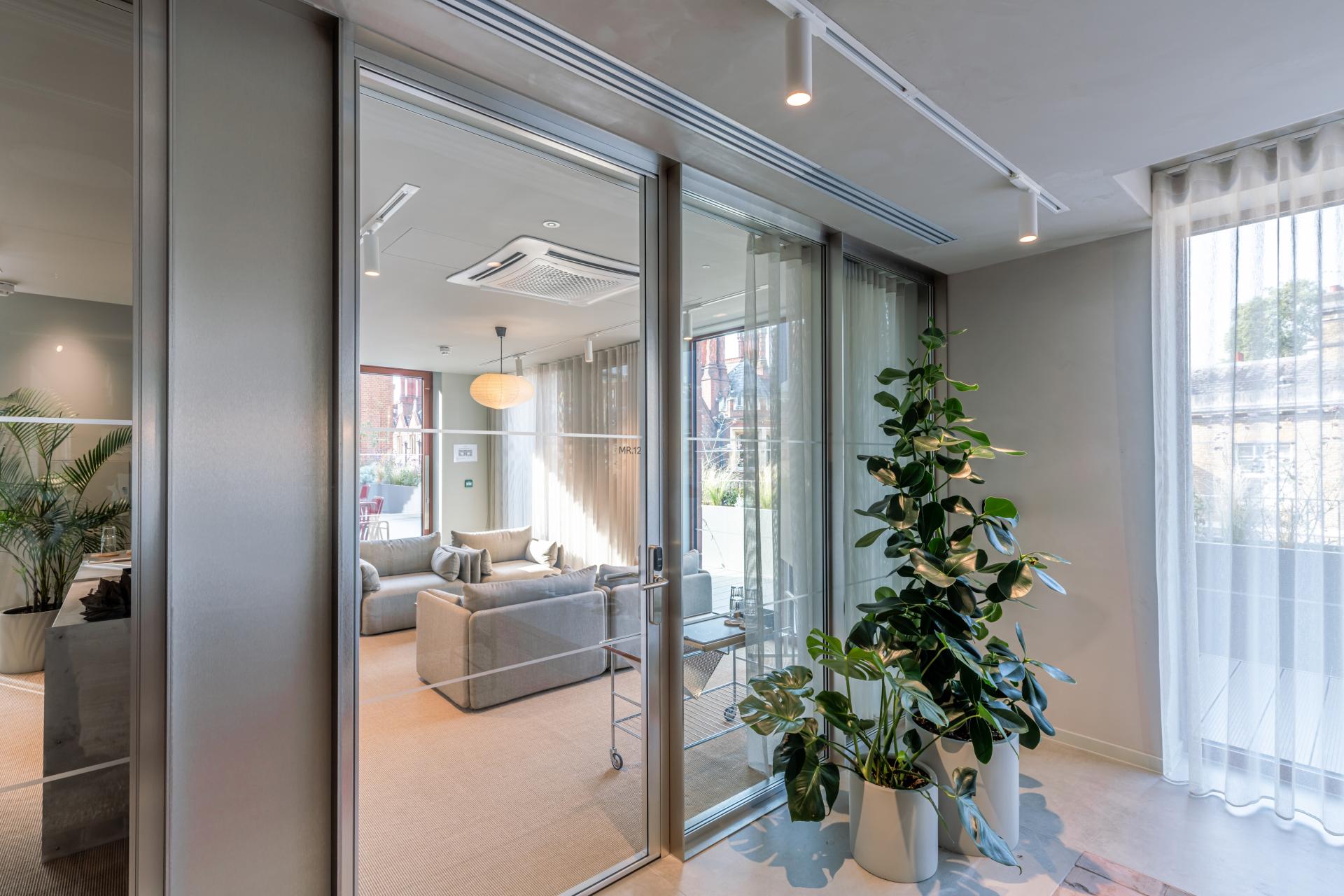 Bright, flexible workspace at Chancery House featuring modern furnishings, greenery, and natural light for enhanced wellbeing.