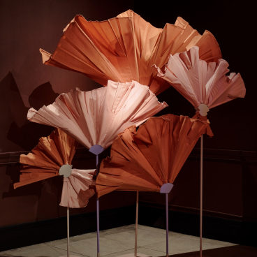 Colorful sculptural flowers made from fabric, displayed at the A Second Life exhibition by Matter of Stuff at sketch.