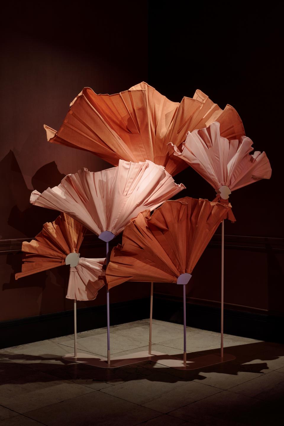 Colorful sculptural flowers made from fabric, displayed at the A Second Life exhibition by Matter of Stuff at sketch.