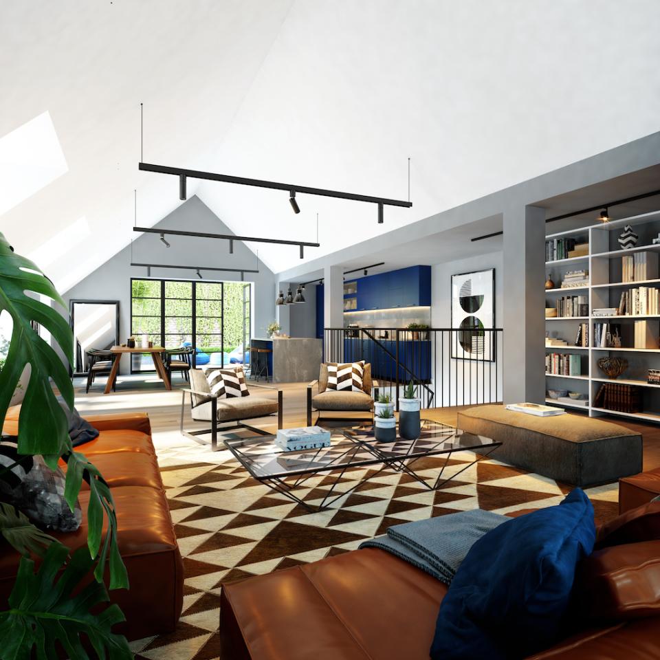Bright and modern loft-style penthouse interior featuring stylish furniture and large windows at Goodluck Hope.