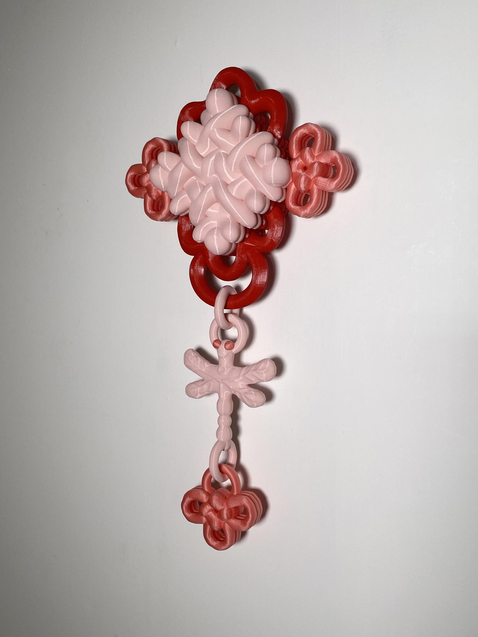 Colorful 3D printed wall decoration featuring intricate floral designs, showcasing Soorin Shin's innovative digital art and design.