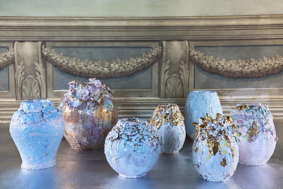 Colorful hand-decorated ceramic vases by Coralla Maiuri, showcasing experimental designs and unique textures.