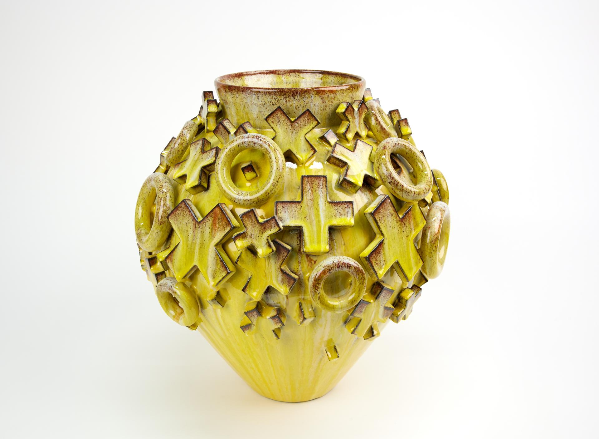Artistic ceramic vase adorned with geometric accents, showcasing innovative design featured at London Craft Week 2024.