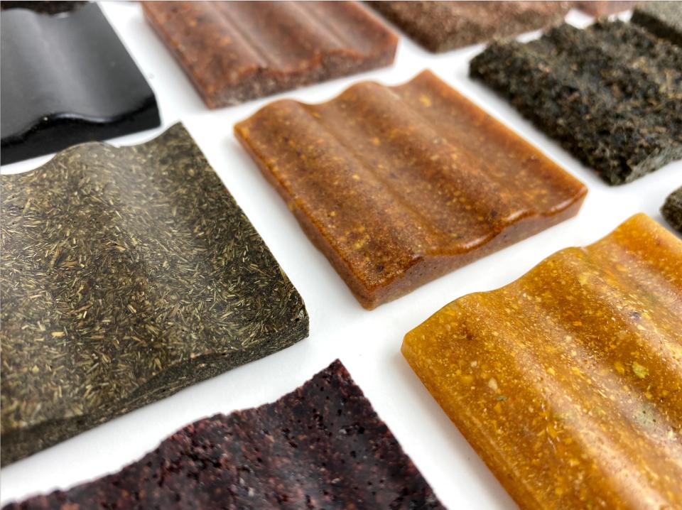 Colorful, textured biomaterials samples arranged on a surface, showcasing innovative designs in sustainable material development.