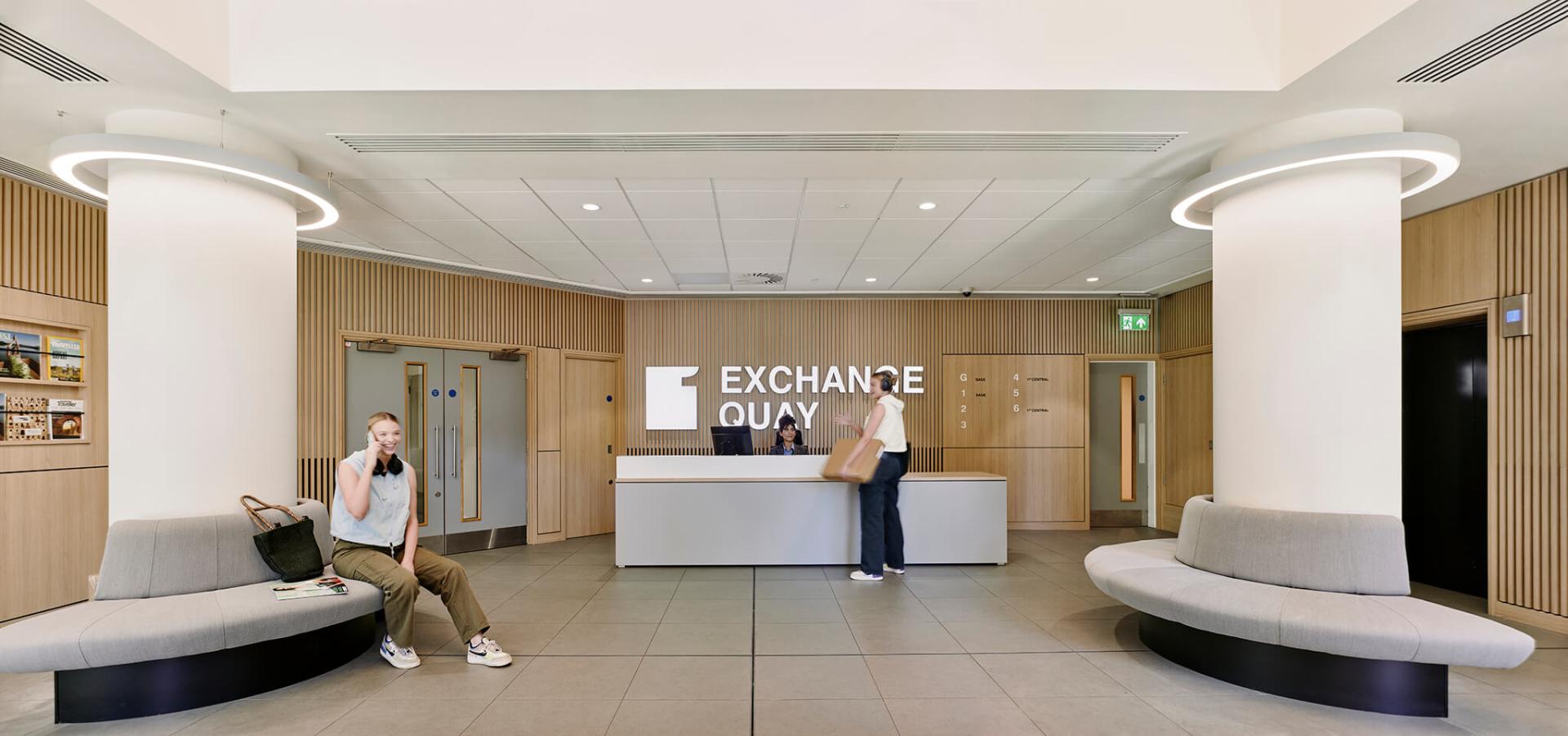 Modern reception area of Exchange Quay featuring stylish seating and sustainable design elements, embodying responsible architecture.