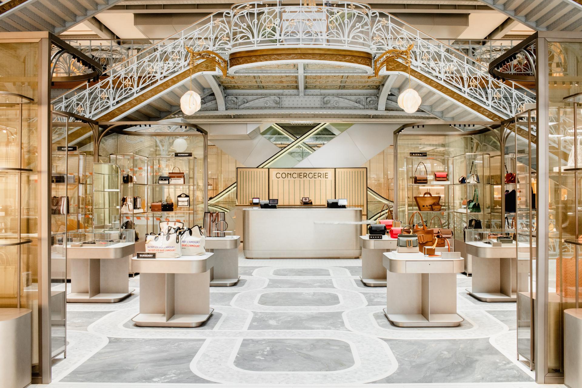 Luxurious interior of a retail space designed by Yabu Pushelberg, featuring elegant displays of designer handbags.