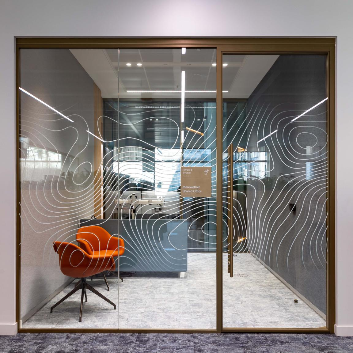 Radii supports tp bennett & Overbury with bespoke bronze framed glazed partitions at banking HQ in London.