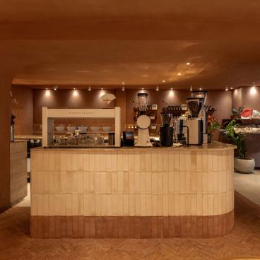 DLSM Studio transforms Qima Café’s second location in the heart of London's Covent Garden.