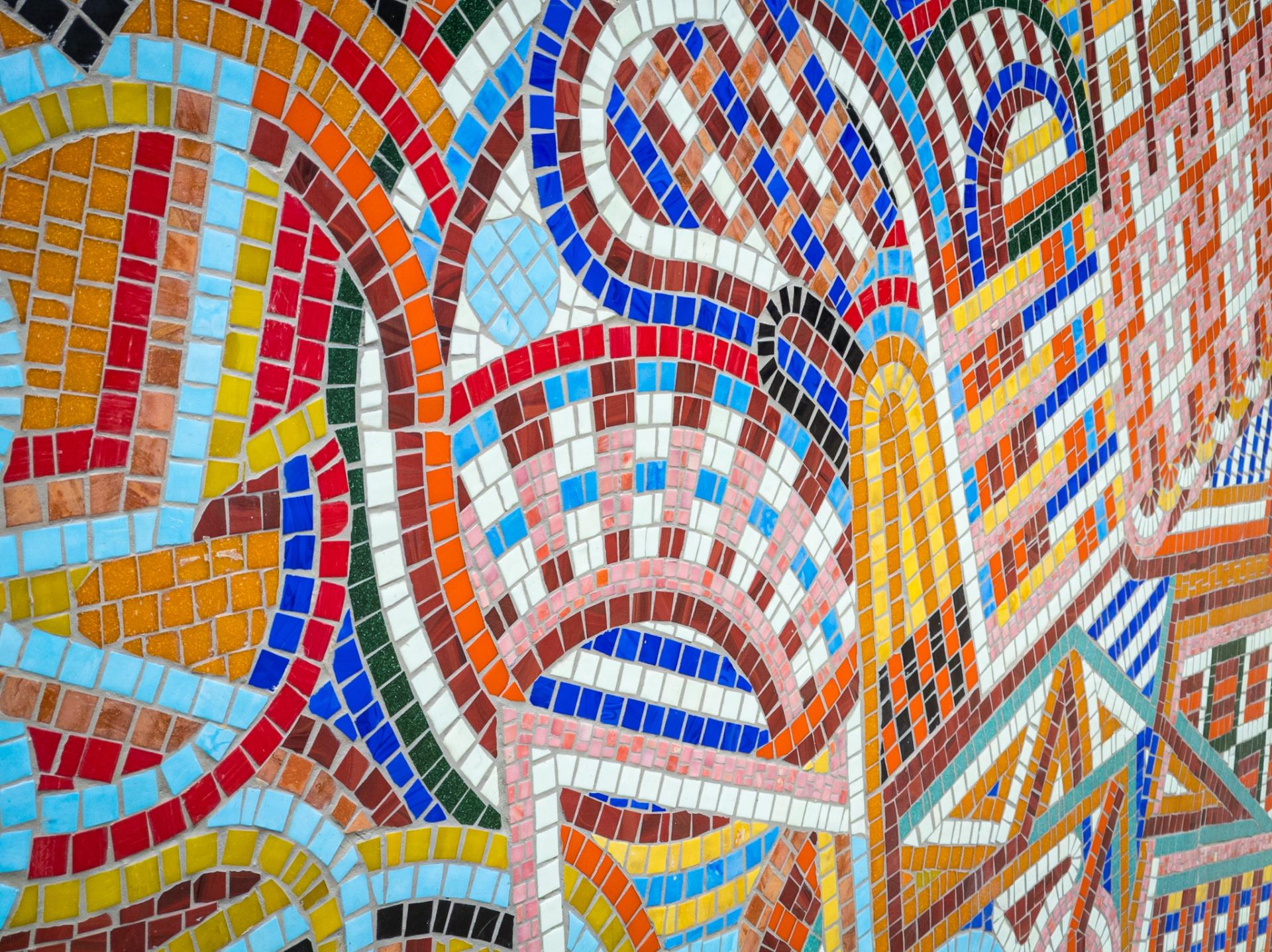 Vibrant mosaic artwork showcasing traditional craft, celebrating community diversity with colorful patterns and textures.