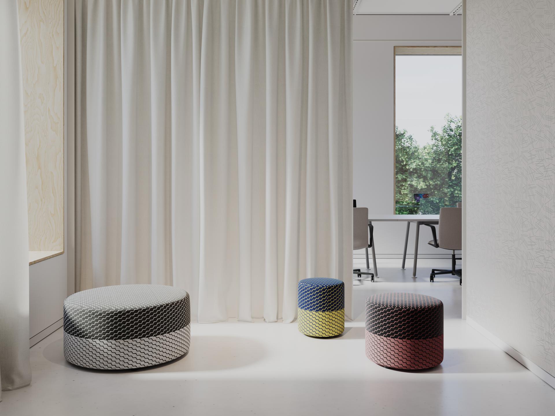 Modern Flock collaboration showcasing stylish patterned poufs by Erica Wakerly in a bright, contemporary workspace.