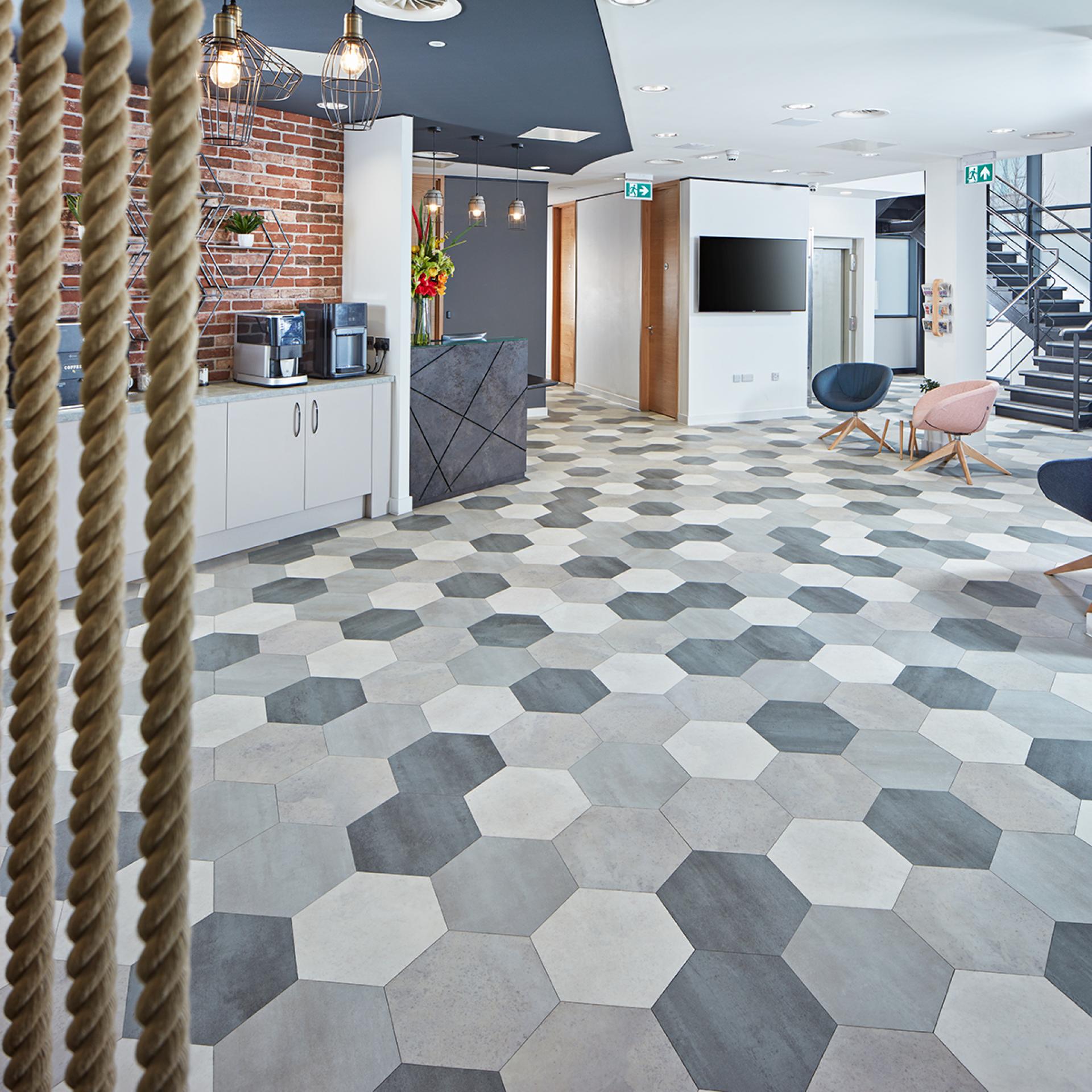 Versatile hexagonal luxury vinyl flooring in a modern interior, showcasing Karndean's innovative design and aesthetic appeal.