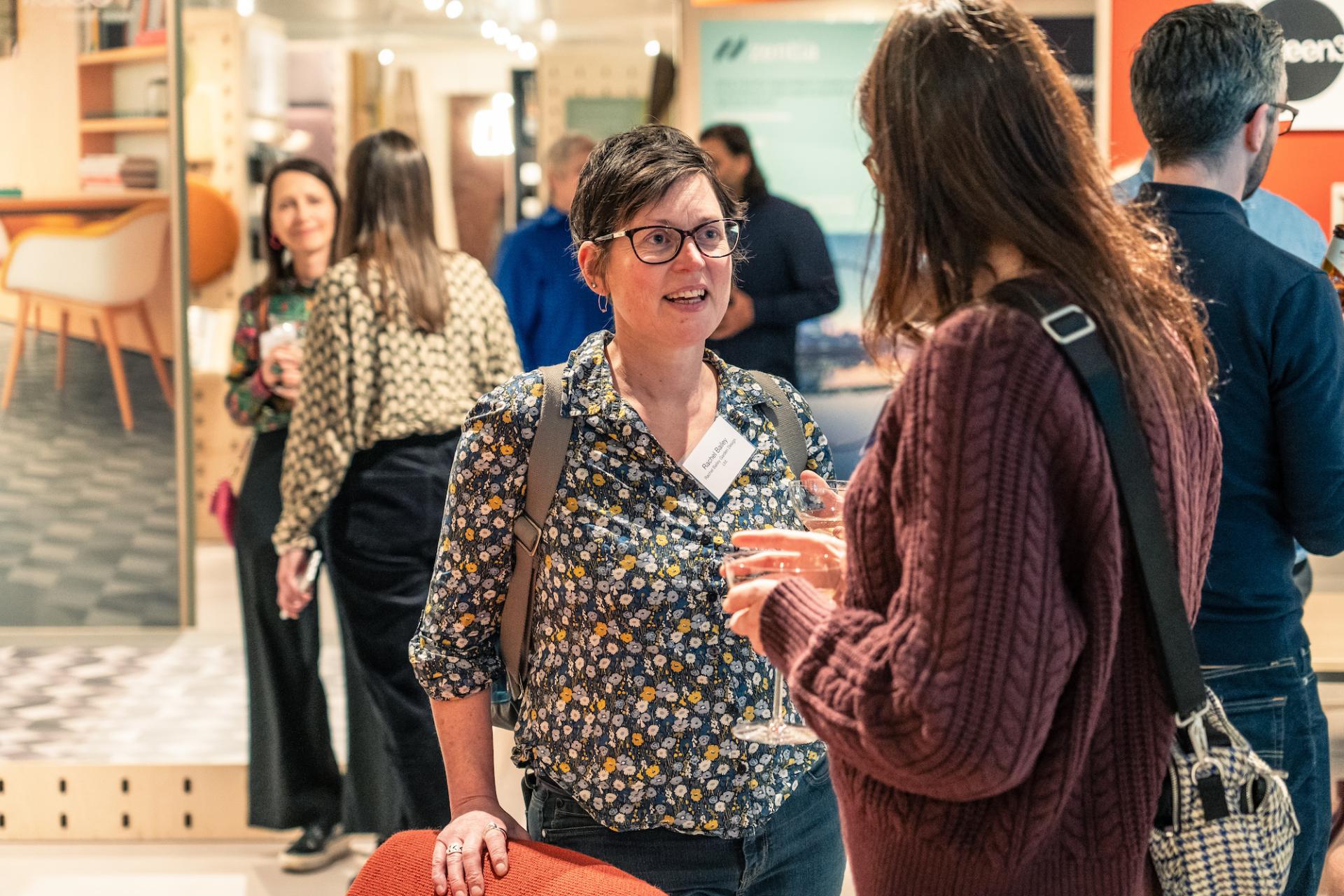 Attendees engaged in conversation at Material Source Studio Glasgow event focused on sustainability and its impact on design.