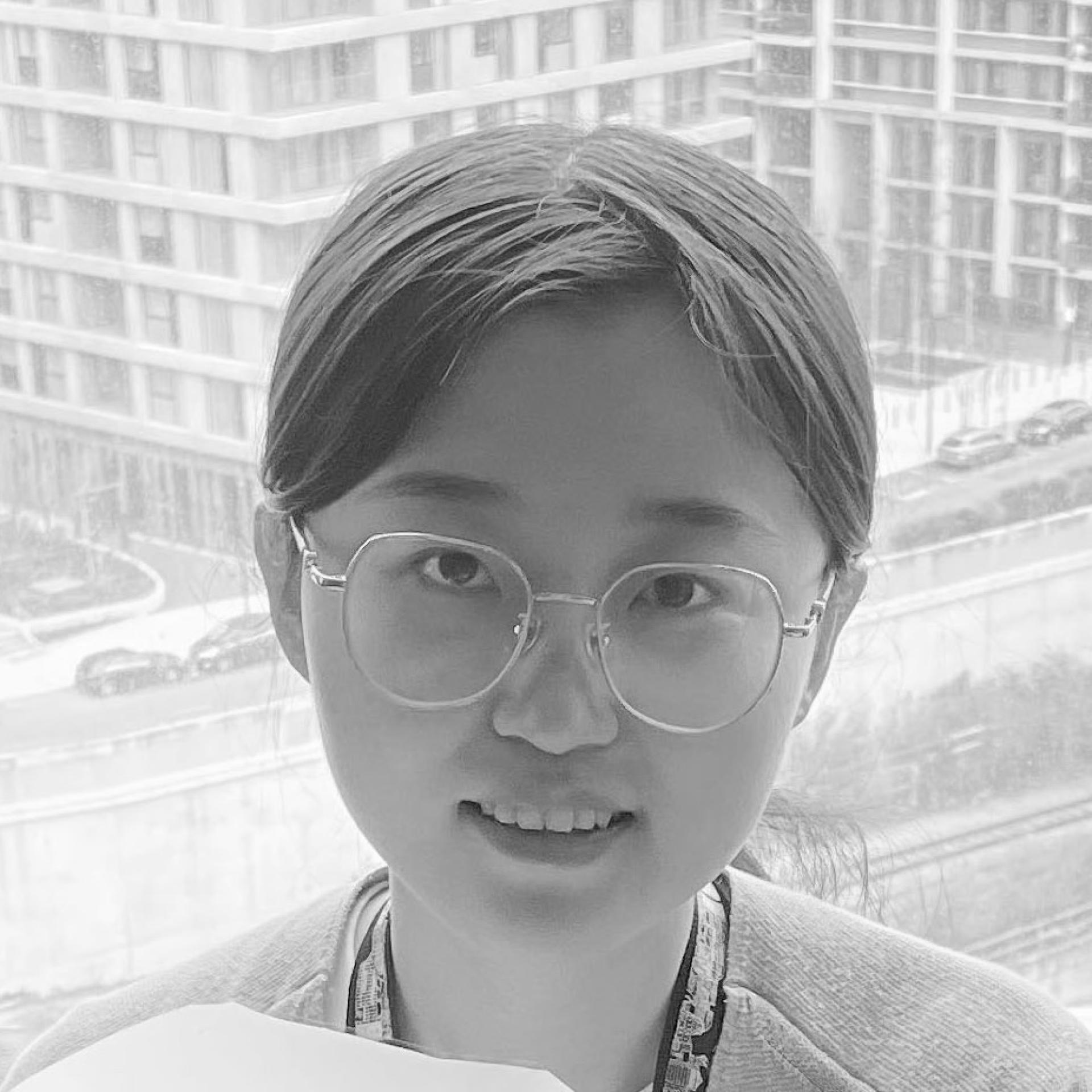 Student at the Bartlett School of Architecture discussing innovative designs for noise-absorbing buildings against a city backdrop.