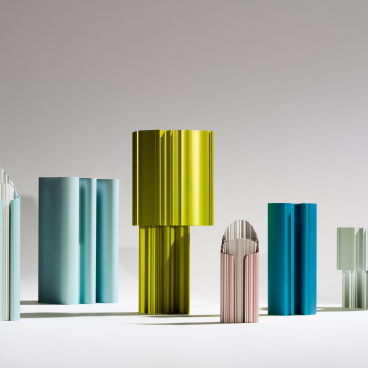 Colorful waste-based sculptures reflecting innovative design, showcased at the Material Matters Fair for sustainable materials.