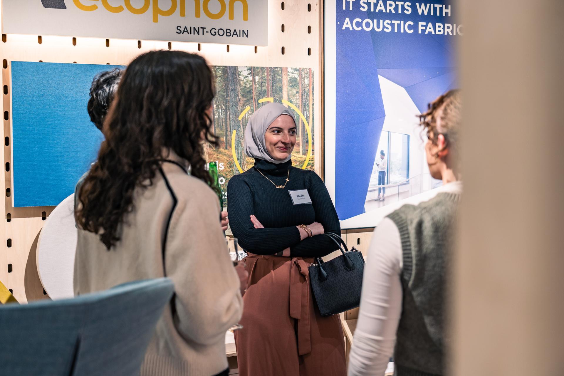 Group of people chat before seminar event