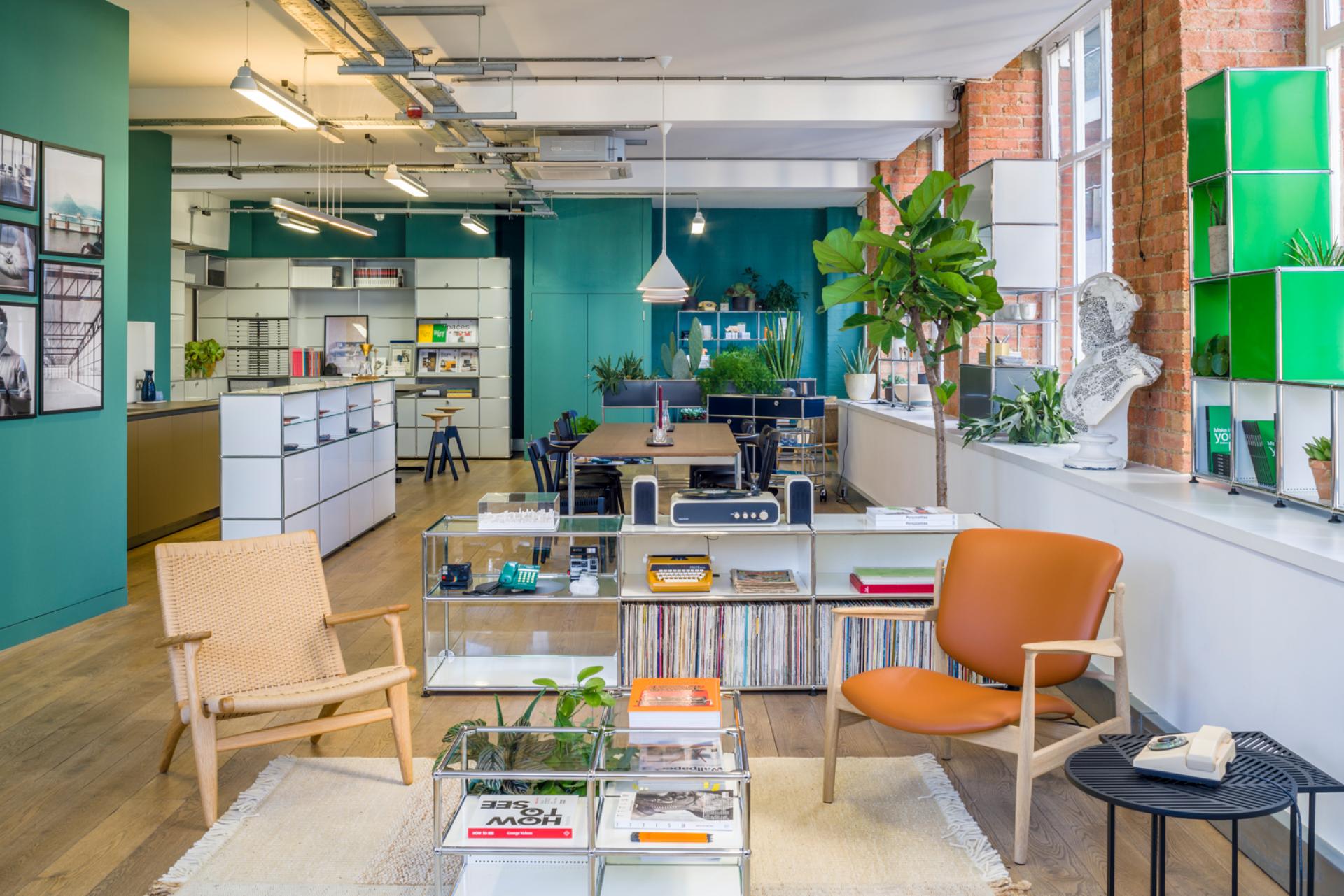Modern Clerkenwell showroom by USM, showcasing modular furniture, stylish decor, and a vibrant open space design.