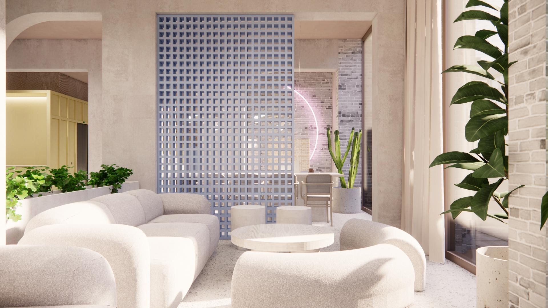 Modern co-living space designed by MONIKA Studio featuring cozy seating, greenery, and decorative elements for Kosy brand.