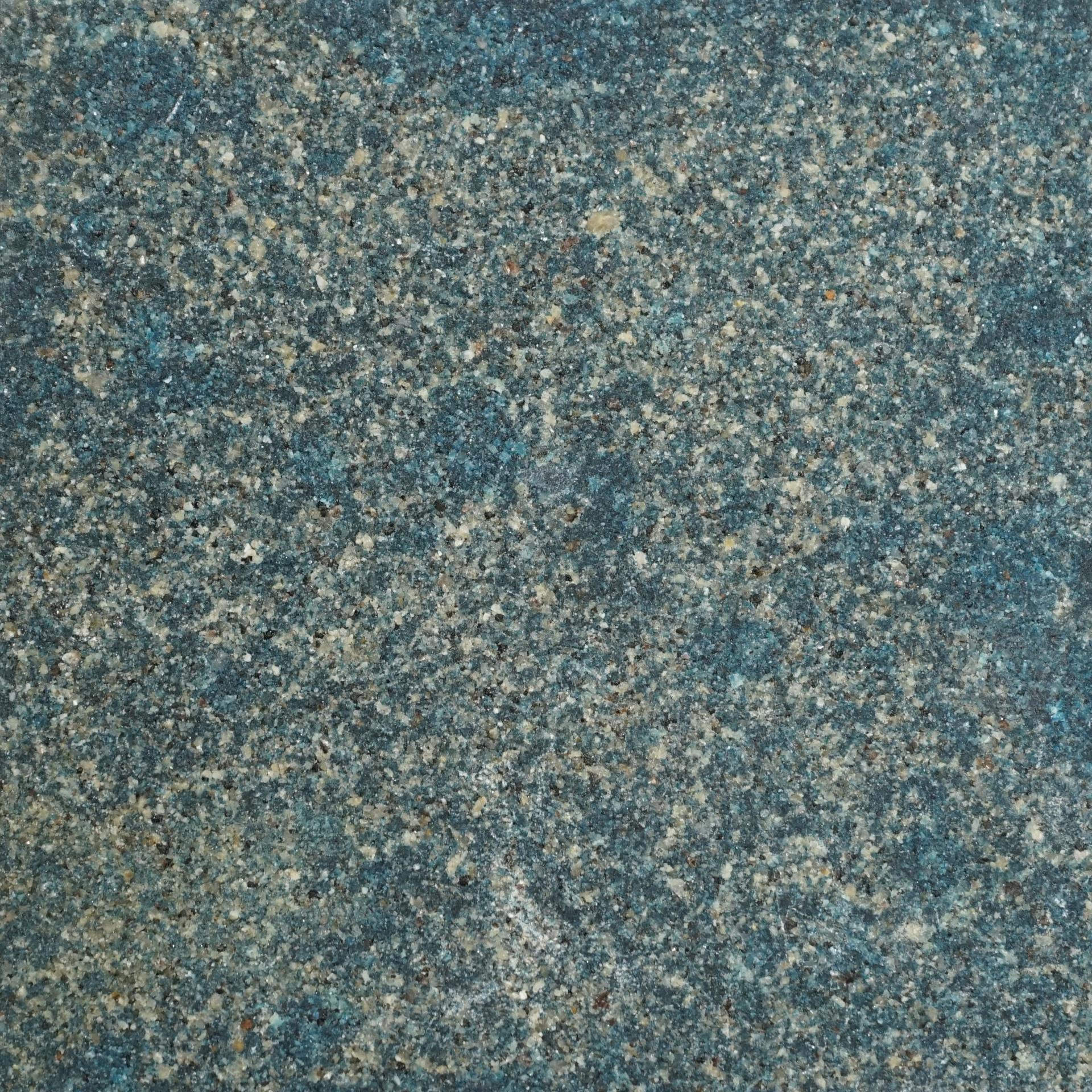 Natural stone texture featuring a mix of blue and earthy tones, illustrating materials used in DeakinBio's maker in residence program.