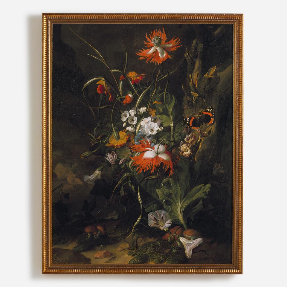 Vibrant dark floral arrangement featuring exotic blooms and butterflies, showcasing Surface View's dramatic interior design aesthetic.