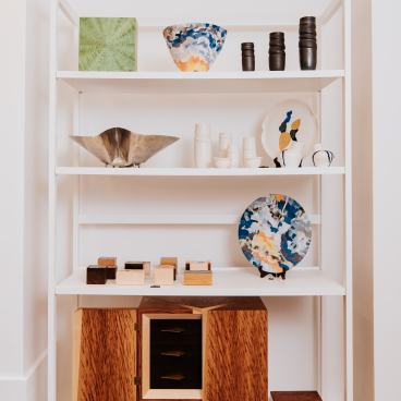 Stylish display of handcrafted design items and art, showcasing diverse materials at Future Icons in Burlington Arcade.
