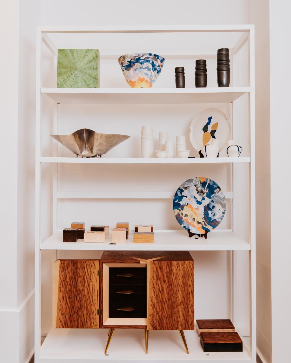 Stylish display of handcrafted design items and art, showcasing diverse materials at Future Icons in Burlington Arcade.