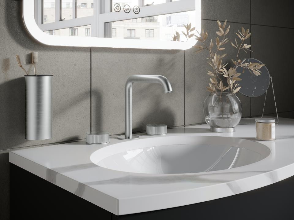 Contemporary bathroom sink with Crosswater's 3ONE6 faucet, stylish accessories, and natural decor elements for a premium finish.